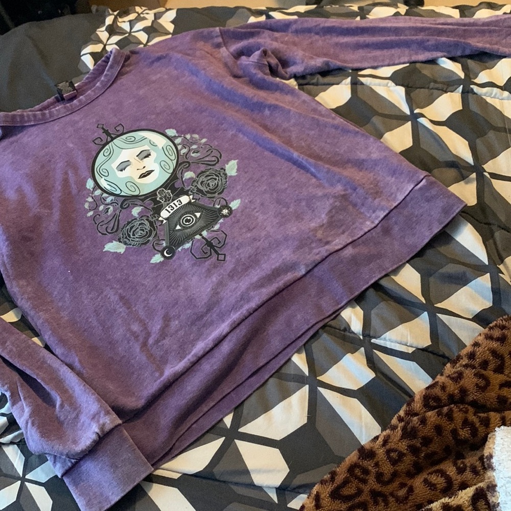 purple sweater from disneys the haunted mansion